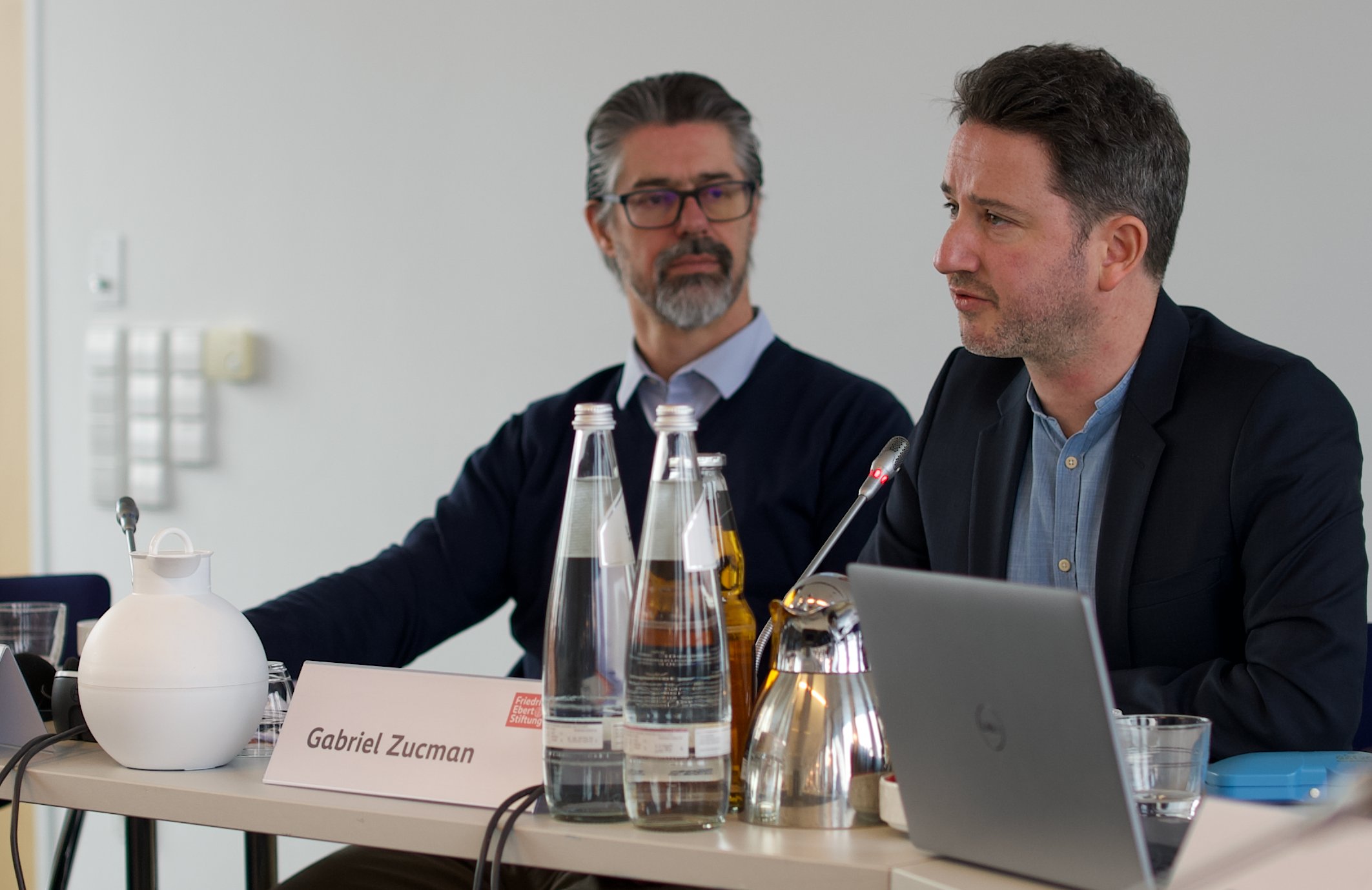 Zucman speaking at an event in Berlin, co-orgnaized by Friedrich Ebert Stiftung and PSI