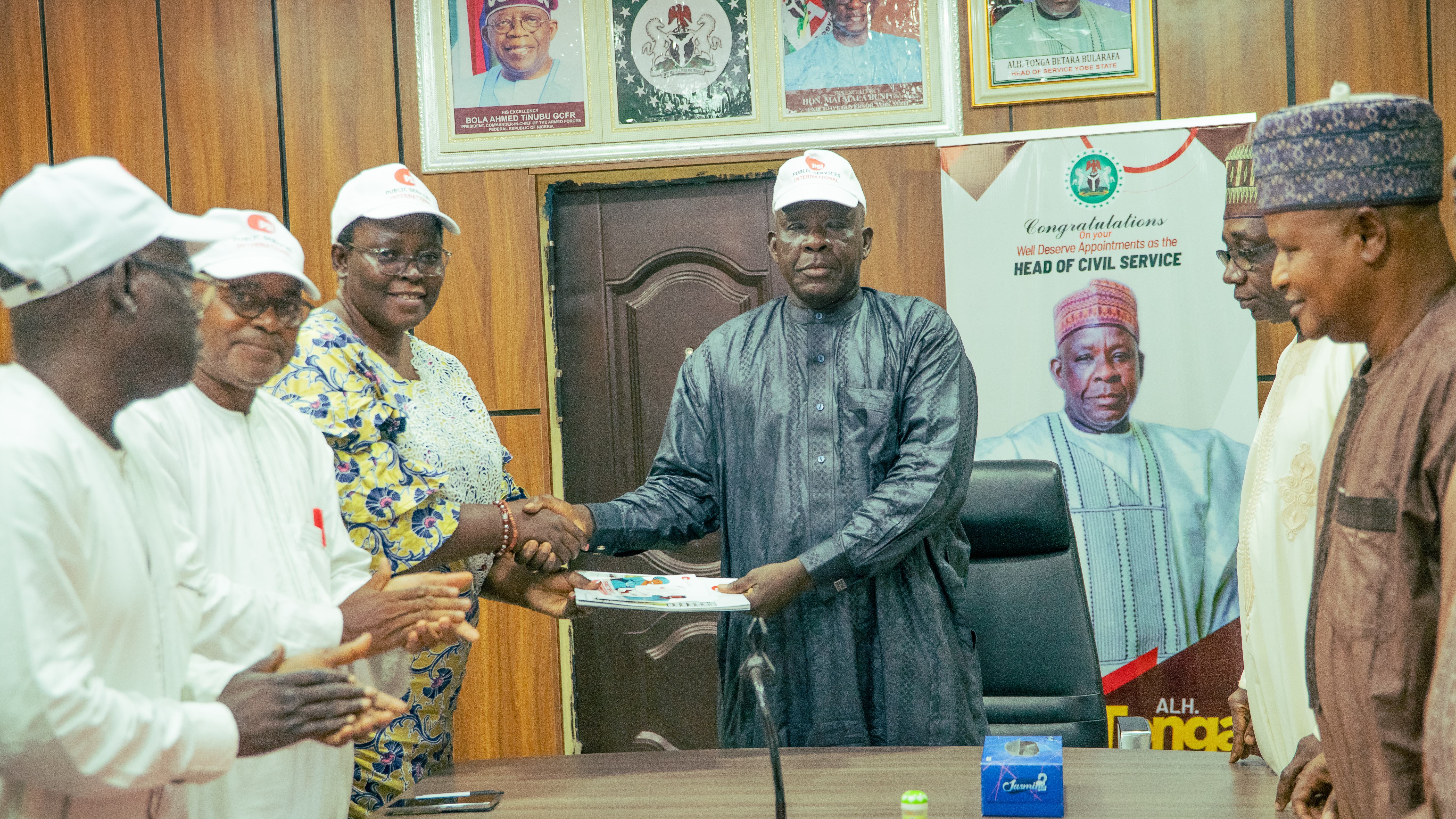 PSI and Unions Presenting publications from the IDP project to Tonga Betara, Head of Service Yobe State.